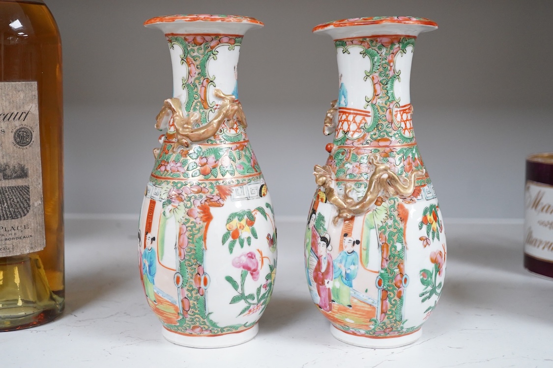 A pair of late 19th century Chinese famille rose porcelain vases, 20cm high
